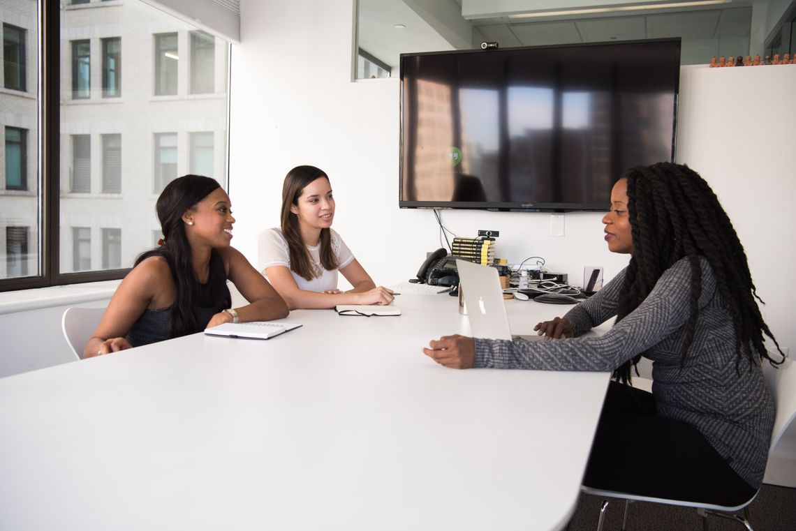 Women having a meeting in a conference room