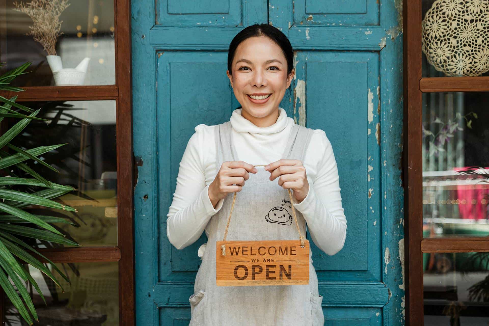 Business owner with a signage