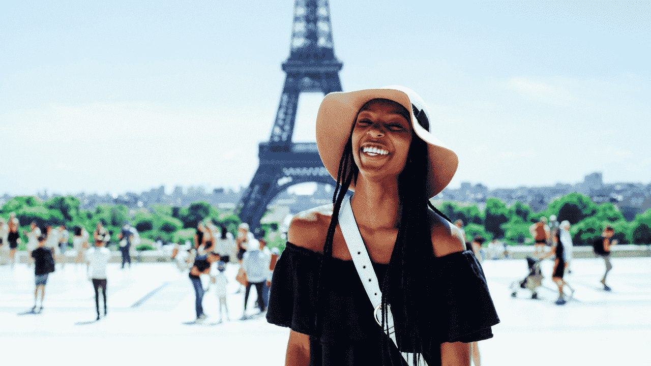 woman in-front of eiffel tower